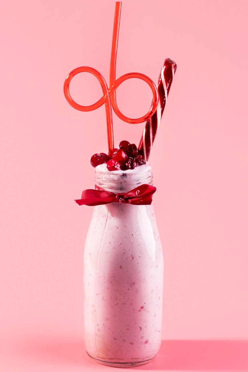 Healthy homemade Smoothie King Angel Food recipe made with bananas, strawberries, almond milk, vanilla extract and Maple Syrup , Vegan, Dairy-Free, high in fiber, antioxidants, Vitamin C, zinc, manganese and potassium - Ideal snack or vacation beverage